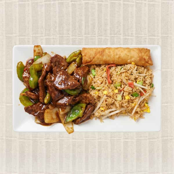 Beef and peppers with fried rice and an egg roll on a white rectangular plate.